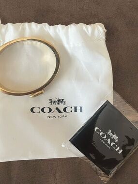 Coach White Enamel Gold Bracelet
